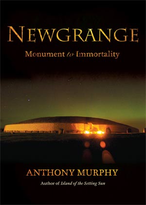 Book cover: Newgrange: Monument to Immortality by Anthony Murphy. Illuminated mound under a starry sky with aurora.